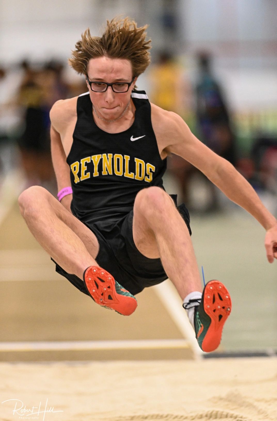 Filip Helmus leaping into the sand in the long jump. Photo provided by Robert Hill